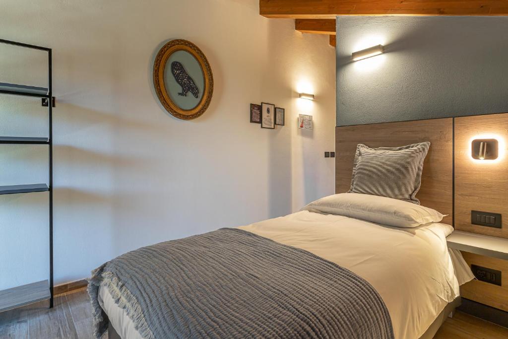 Postel nebo postele na pokoji v ubytování Hotel Mon Émile