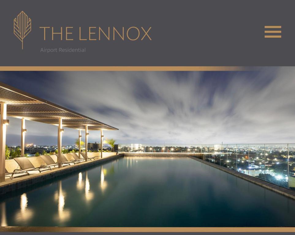 a view of a pool at the leominos hotel at Piano and Gold at The Lennox, Airport Residential in Accra