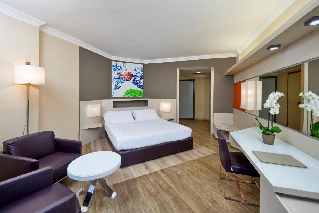 Ein Sitzbereich in der Unterkunft Park Hotel I Lecci