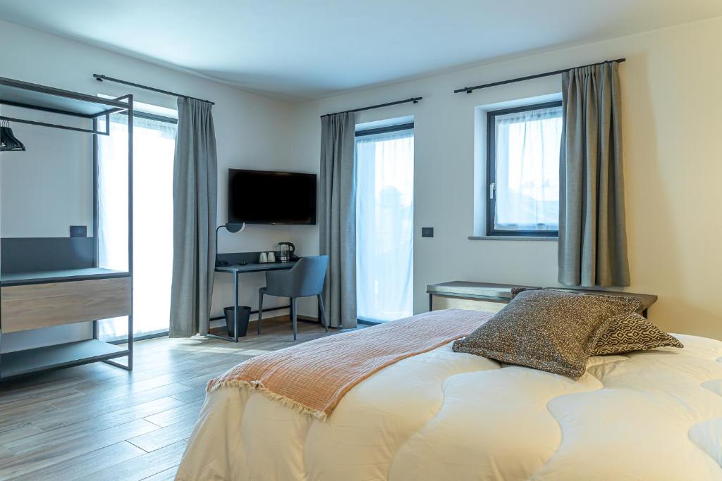 Postel nebo postele na pokoji v ubytování Hotel Mon Émile