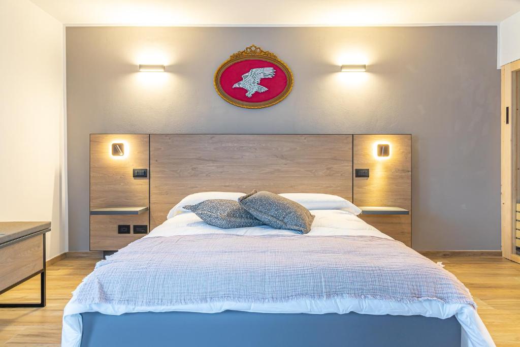 Postel nebo postele na pokoji v ubytování Hotel Mon Émile