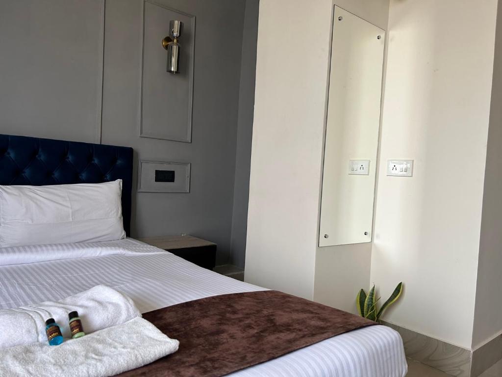 Postel nebo postele na pokoji v ubytování The Aster Penthouse