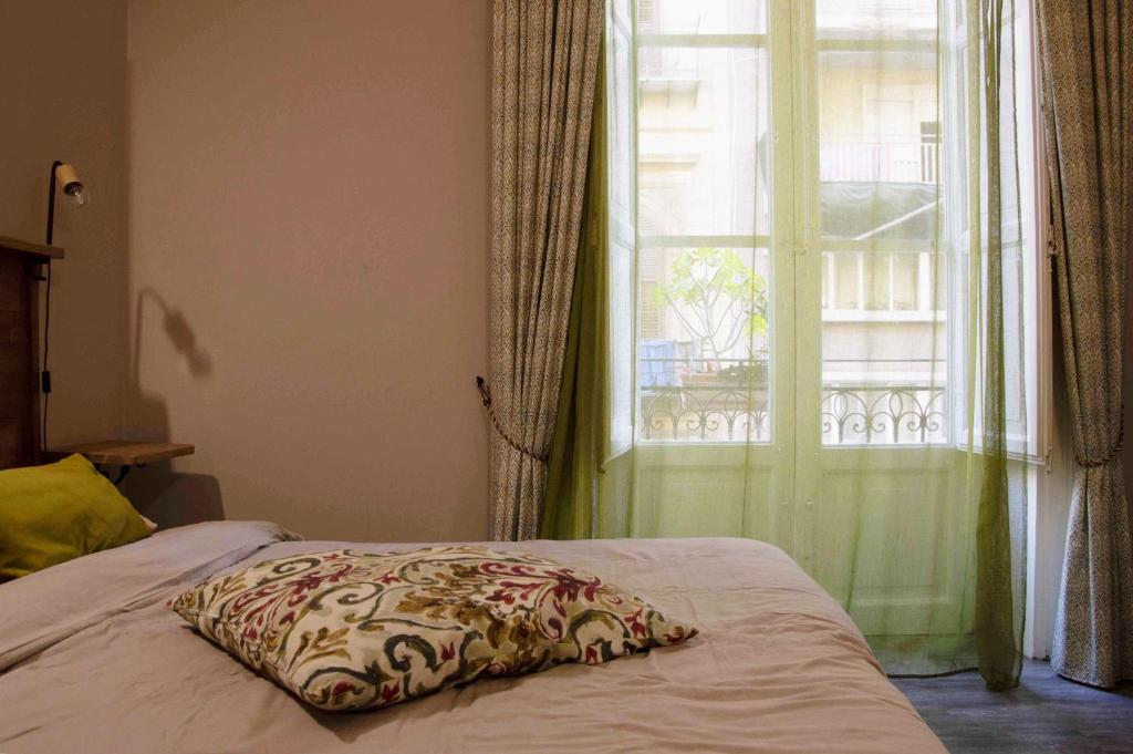 Łóżko lub łóżka w pokoju w obiekcie B&B Benincasa