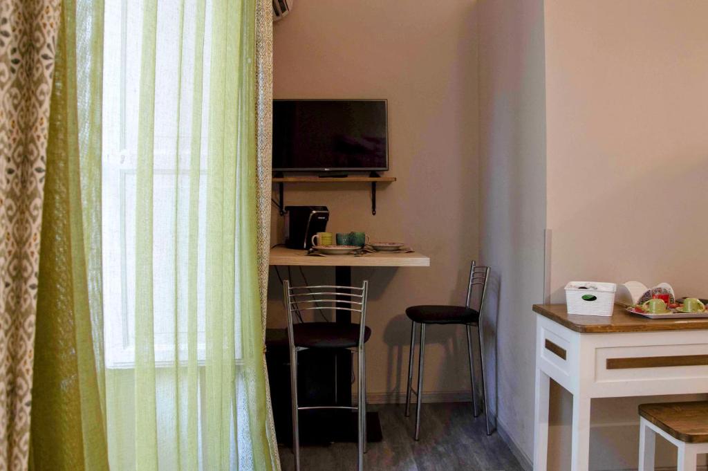 Telewizja i/lub zestaw kina domowego w obiekcie B&B Benincasa