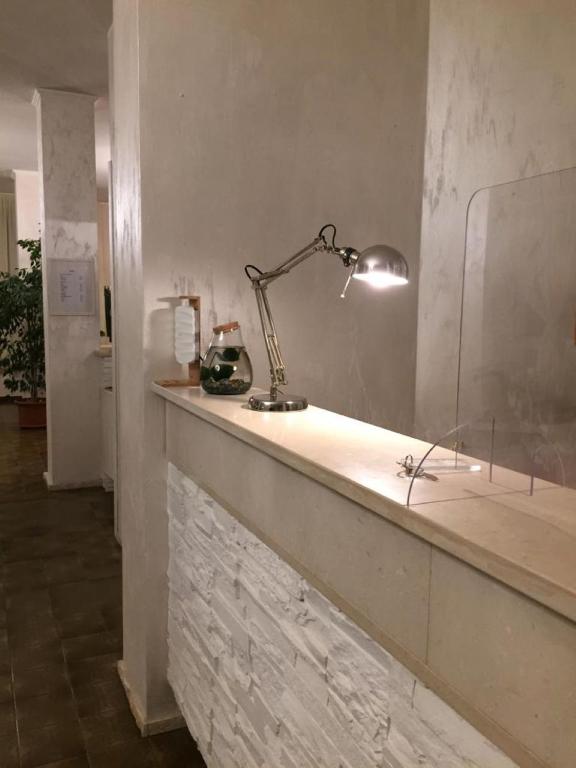 Koupelna v ubytování Hotel President