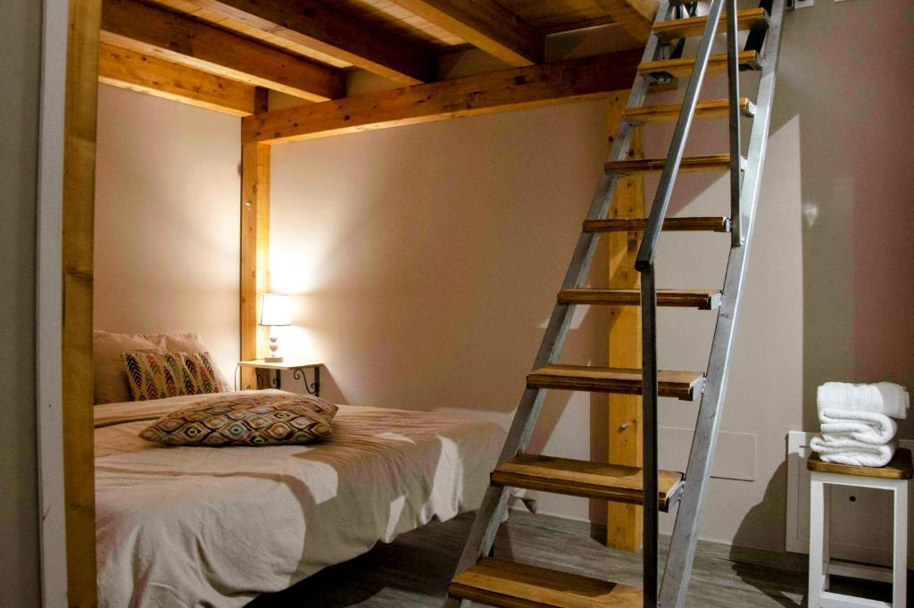 Łóżko lub łóżka w pokoju w obiekcie B&B Benincasa