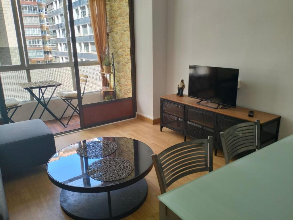 TV a/nebo společenská místnost v ubytování Apartamento El Real