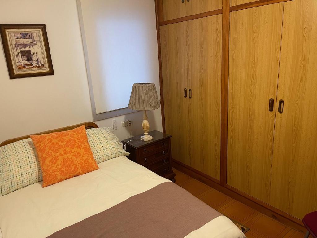 Posteľ alebo postele v izbe v ubytovaní Apartamento Ravel Playa Málaga