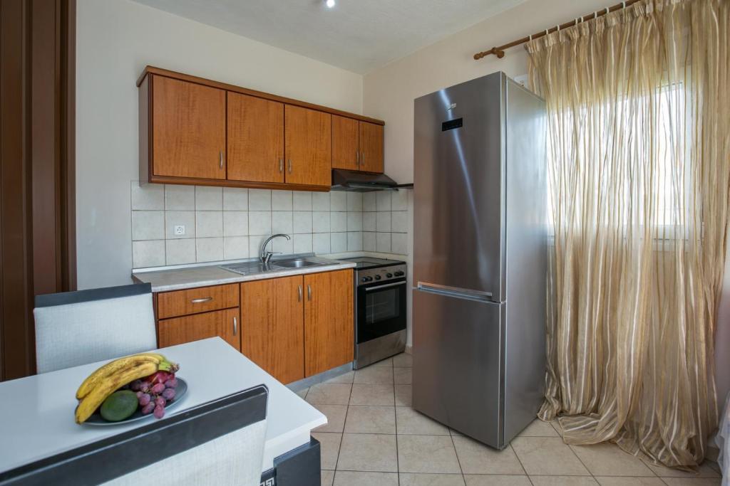 Kuchyň nebo kuchyňský kout v ubytování Kapahi Magic Hotel Apartments