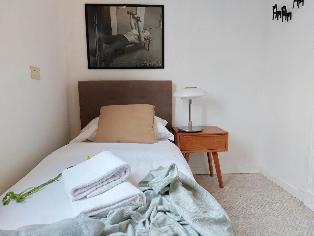 A bed or beds in a room at Prestigious Tagliamento Terrace