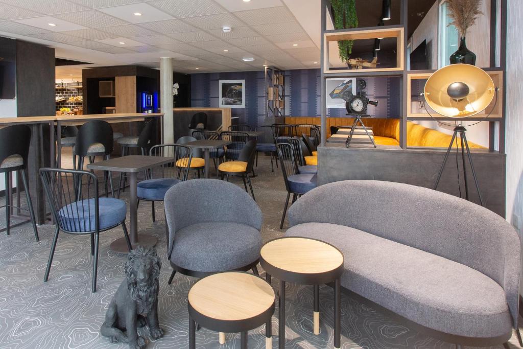 Posezení v ubytování ACE Hôtel Lyon Vénissieux Parc des Expositions