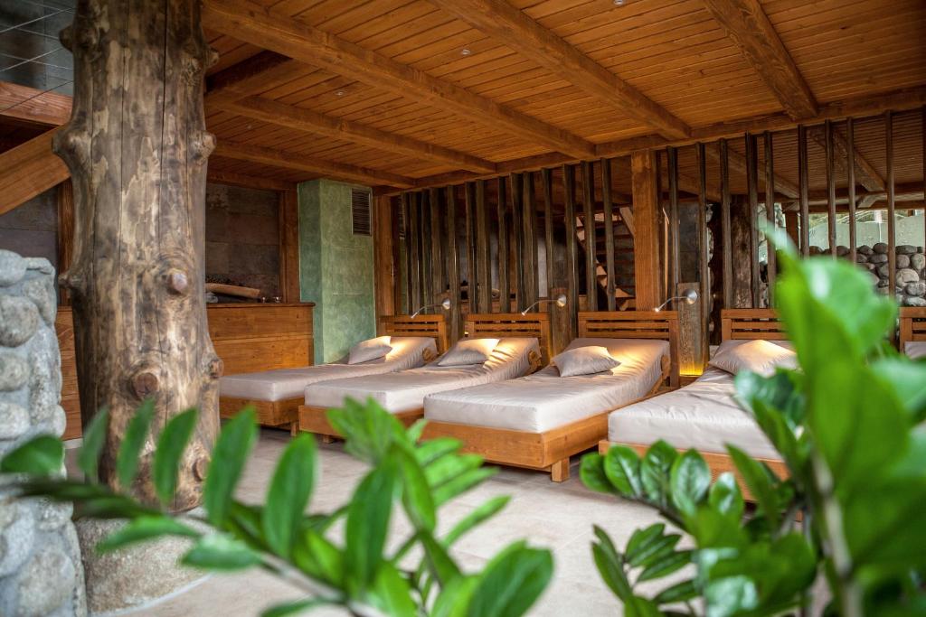 Postel nebo postele na pokoji v ubytování Hotel Partizán