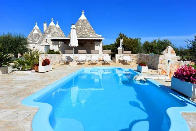 The swimming pool at or close to Trullo Antico with exclusive swimming pool