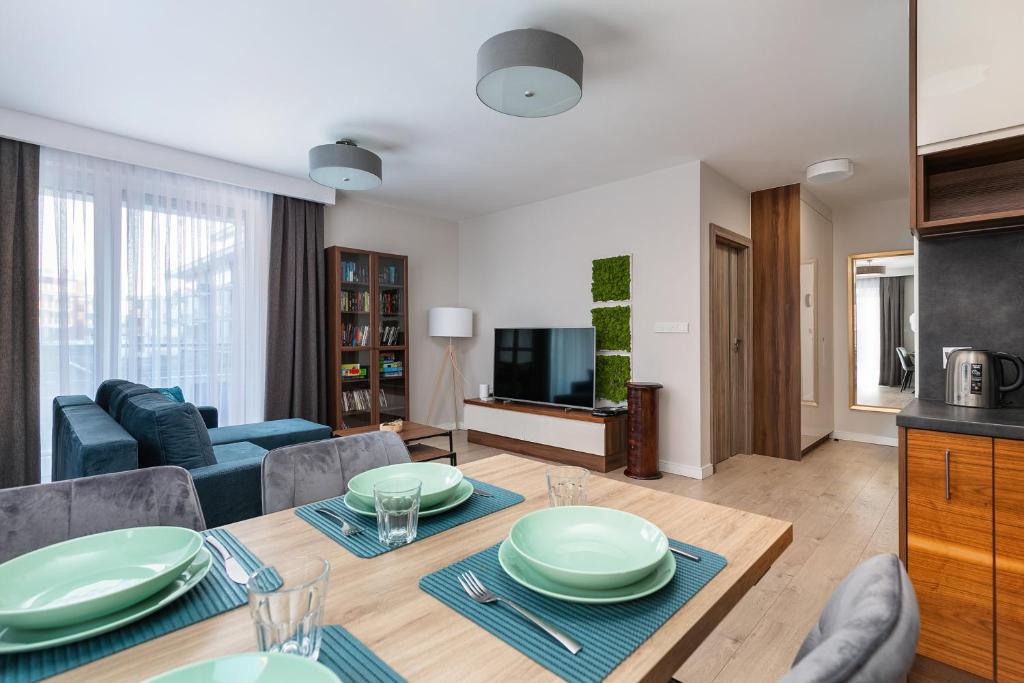 TV a/nebo společenská místnost v ubytování Apartament Holiday 9