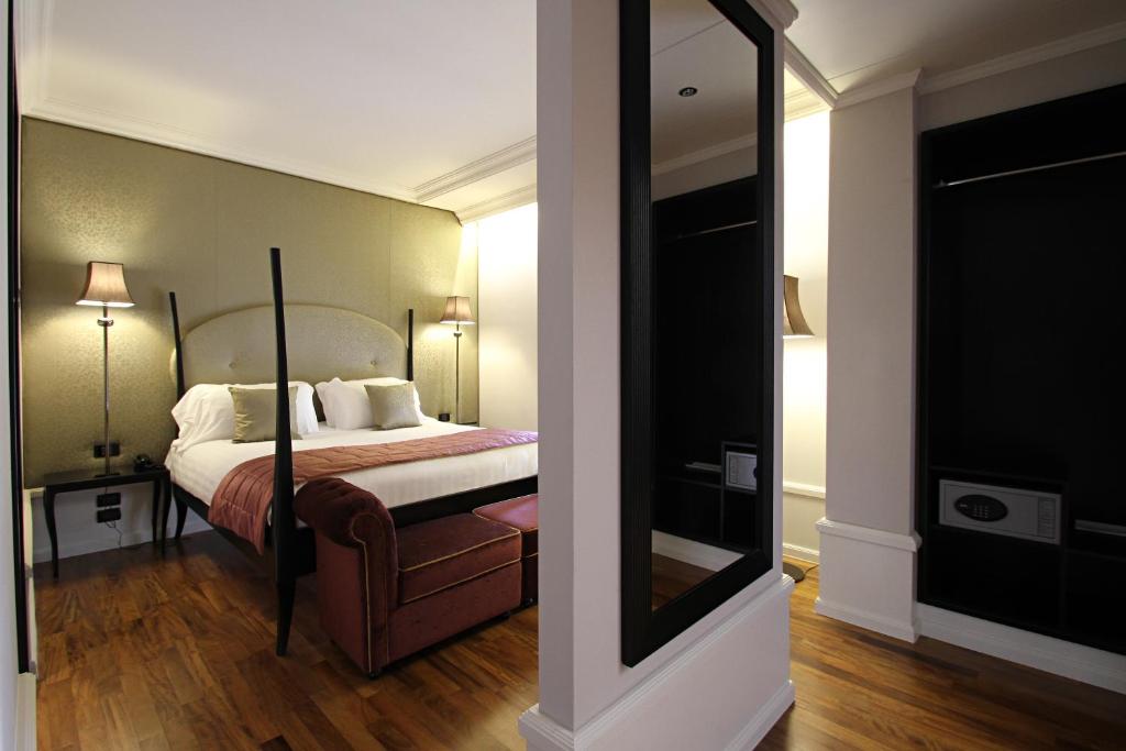 Łóżko lub łóżka w pokoju w obiekcie Hotel Milano & SPA***S
