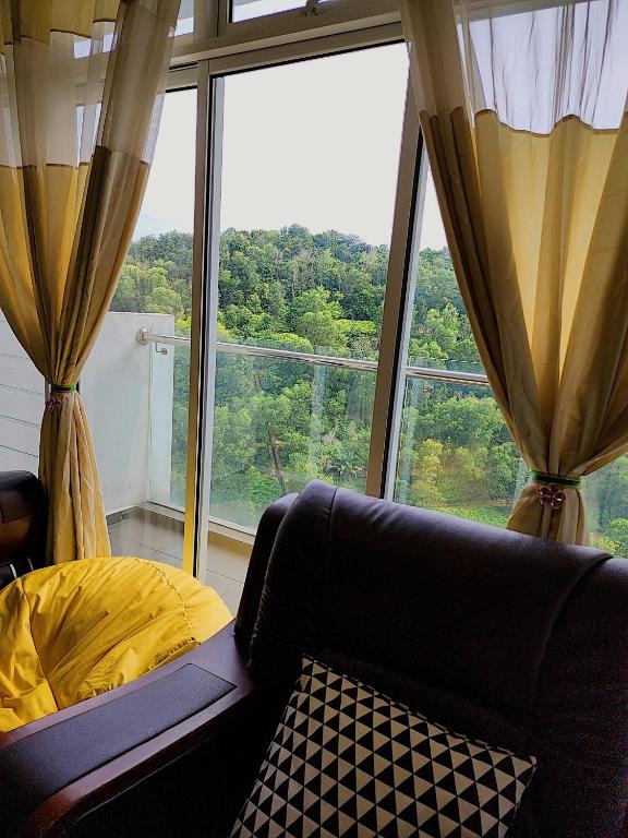 Posezení v ubytování Putrajaya Dwiputra 6 Plus 1 PAX Blissful Fully Air-Con SUITE