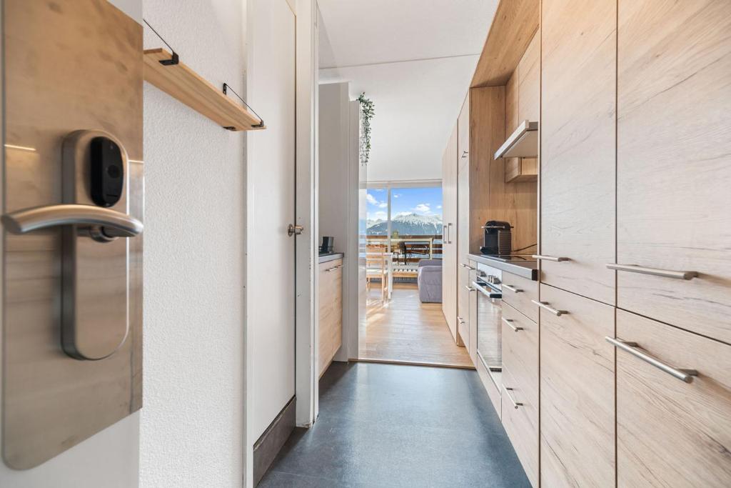 Kuchyň nebo kuchyňský kout v ubytování Chaleureux studio à Anzère, accessible à ski, proche de tout