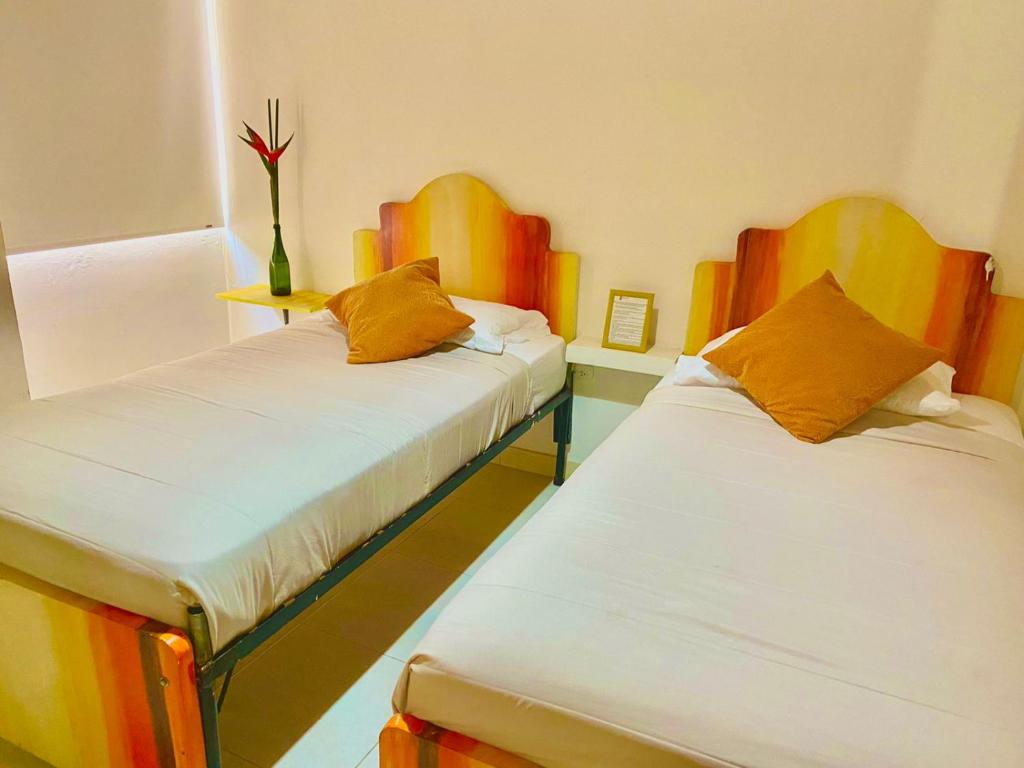 Postel nebo postele na pokoji v ubytování Hotel Casa La Pilonera