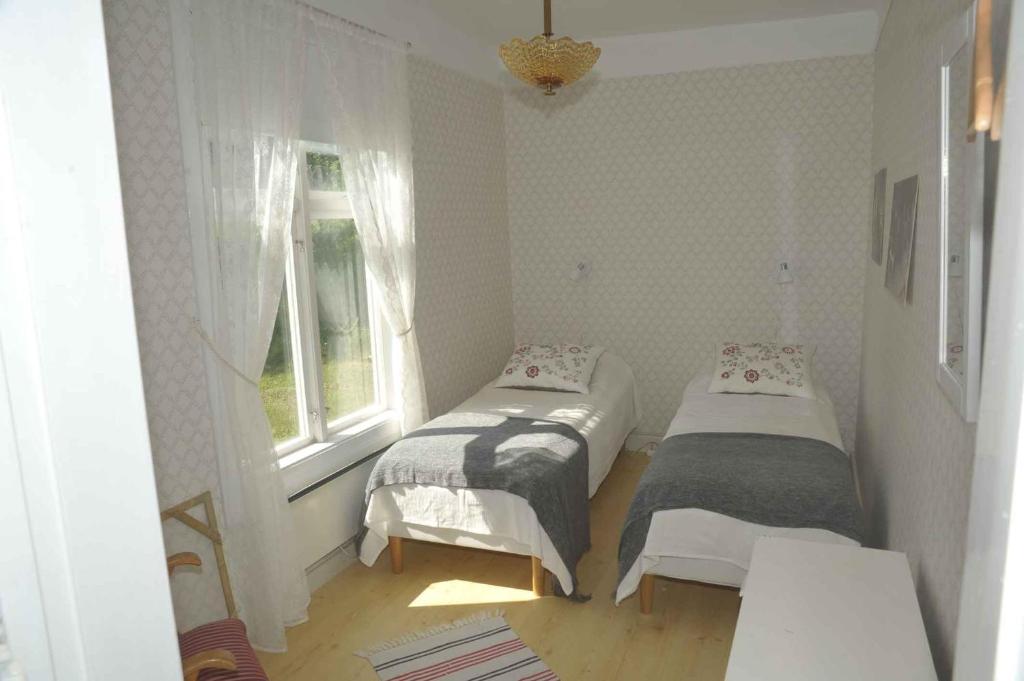 Postel nebo postele na pokoji v ubytování Bruksgården