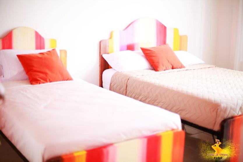Postel nebo postele na pokoji v ubytování Hotel Casa La Pilonera