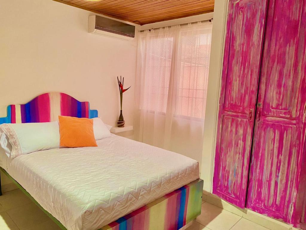 Postel nebo postele na pokoji v ubytování Hotel Casa La Pilonera