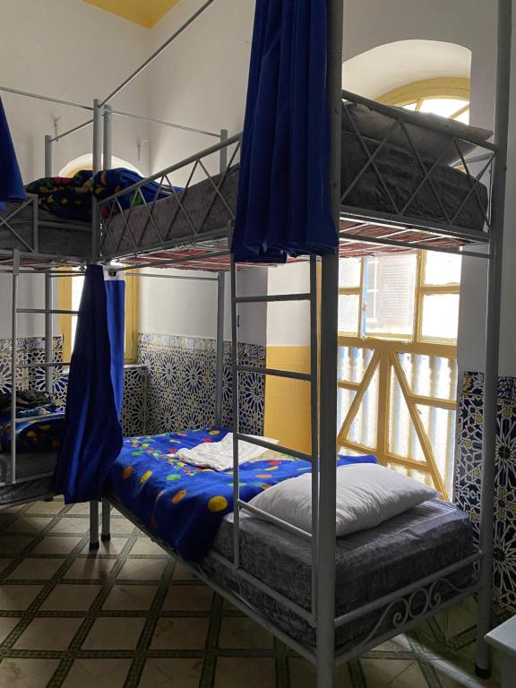 Postel nebo postele na pokoji v ubytování Atlantic Hostel