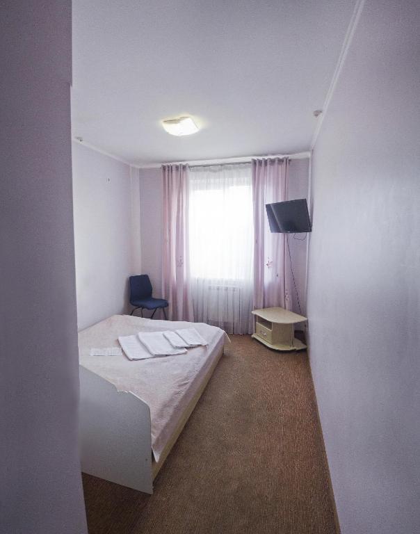 Postel nebo postele na pokoji v ubytování Motel