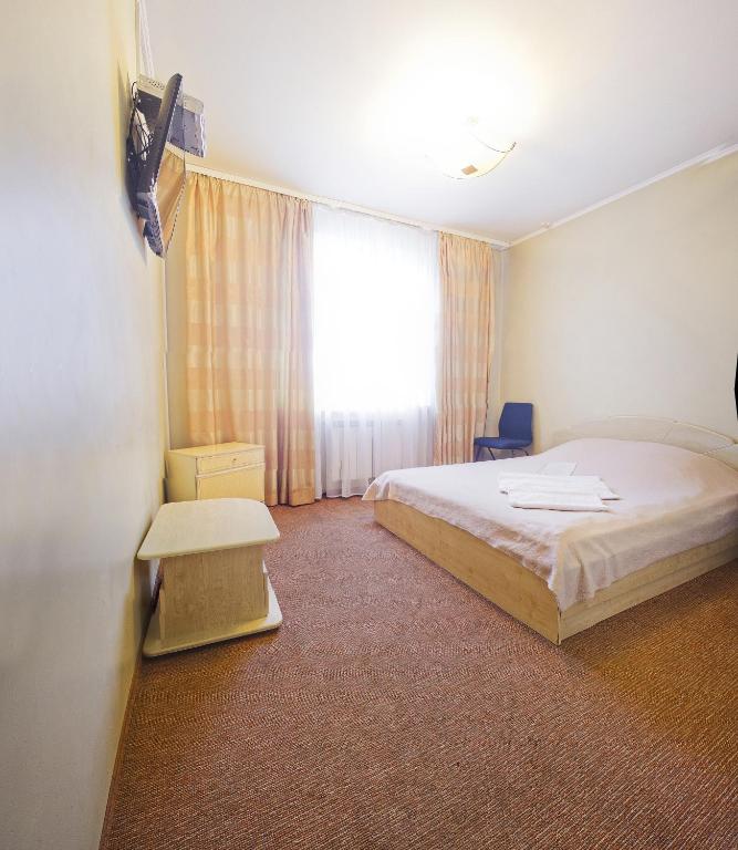 Postel nebo postele na pokoji v ubytování Motel
