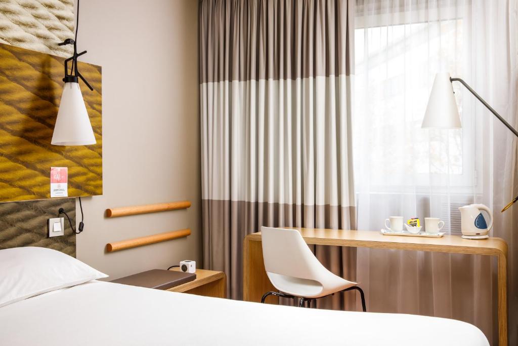 Postel nebo postele na pokoji v ubytování ibis Bristol Centre