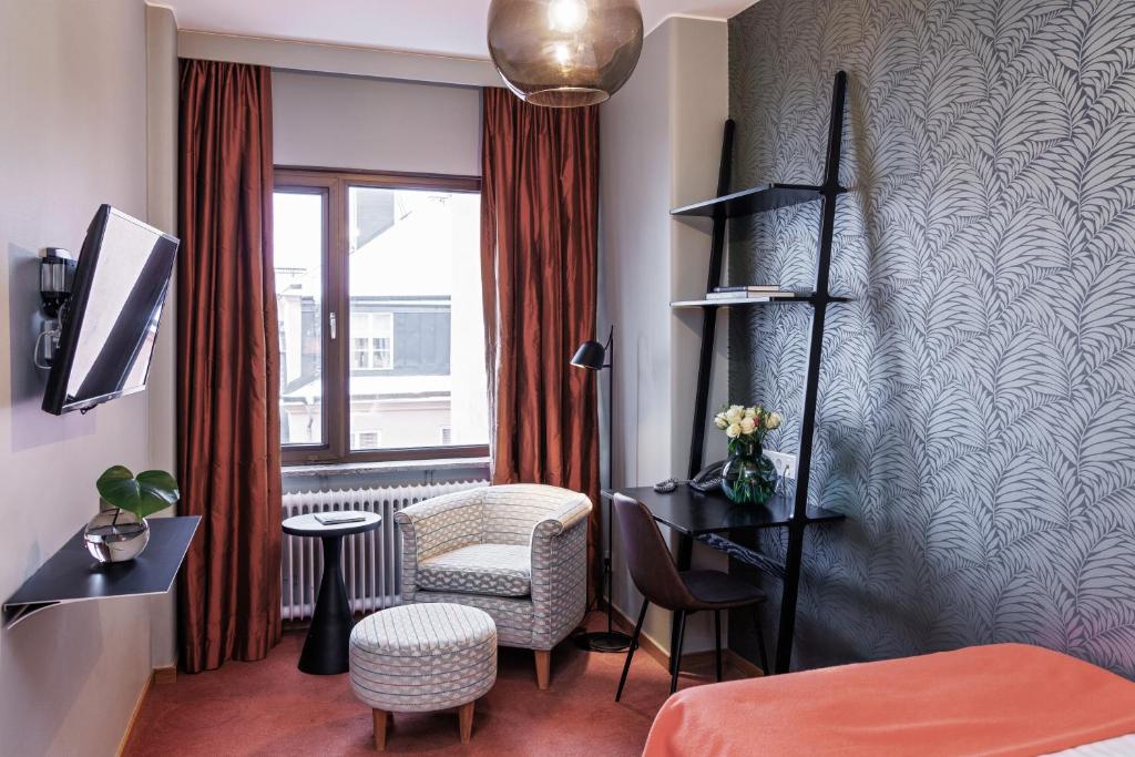 TV a/nebo společenská místnost v ubytování Home Hotel Wellington