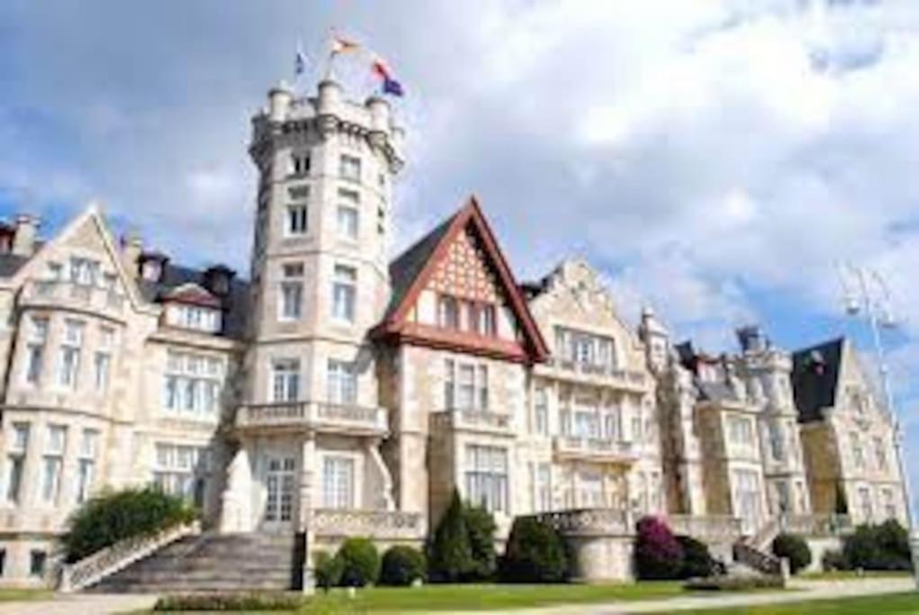 a large building with a tower on top of it at Santander centro in Santander
