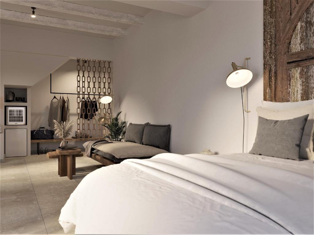 Postel nebo postele na pokoji v ubytování F Fine Suites - Adults Only