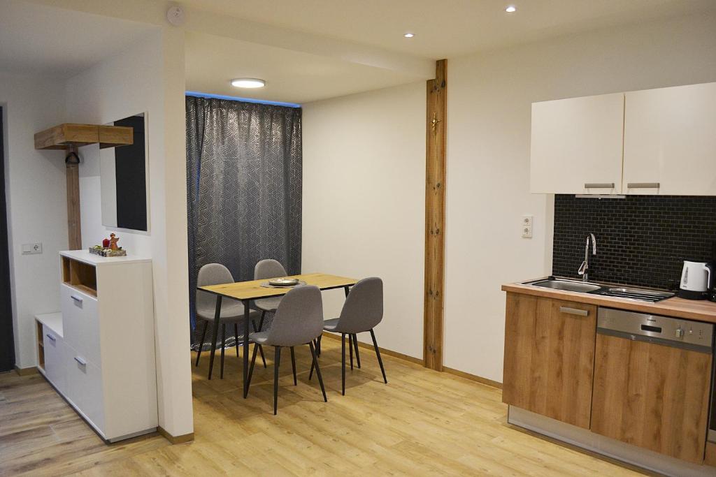 Kuchyň nebo kuchyňský kout v ubytování Appartement Diana