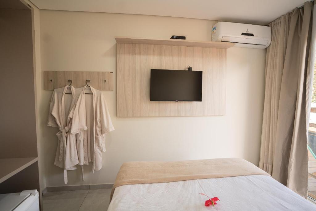 Postel nebo postele na pokoji v ubytování Pousada Tartarugas Marinhas