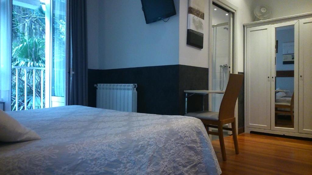 Posteľ alebo postele v izbe v ubytovaní Hostal San Sebastian Centro