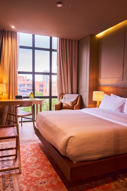 Postel nebo postele na pokoji v ubytování Hotel Coco