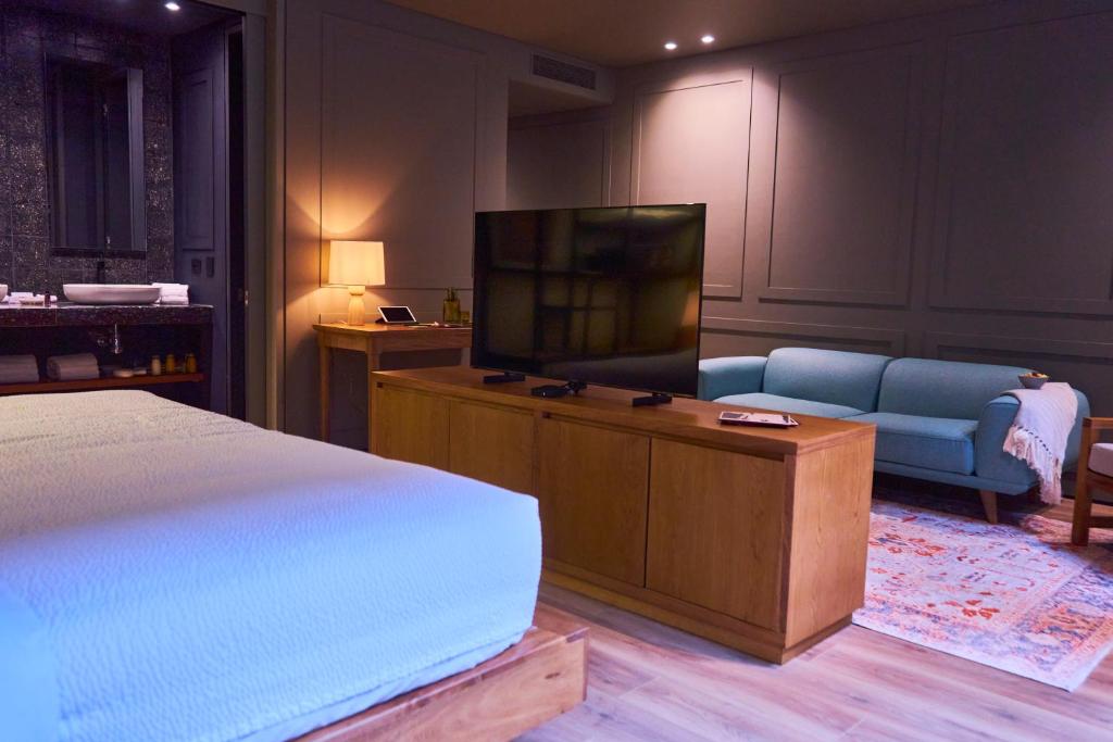 Postel nebo postele na pokoji v ubytování Hotel Coco