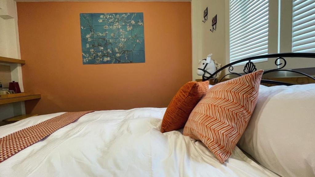 Postel nebo postele na pokoji v ubytování Mu Ju B&B