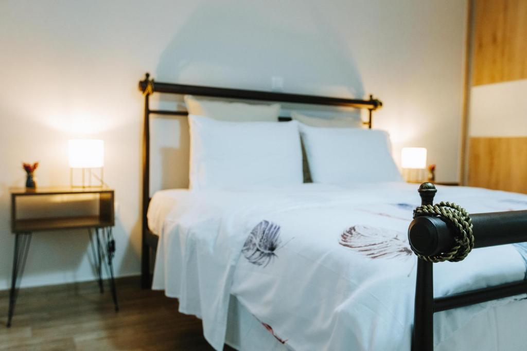 Postel nebo postele na pokoji v ubytování Hermes Appartment