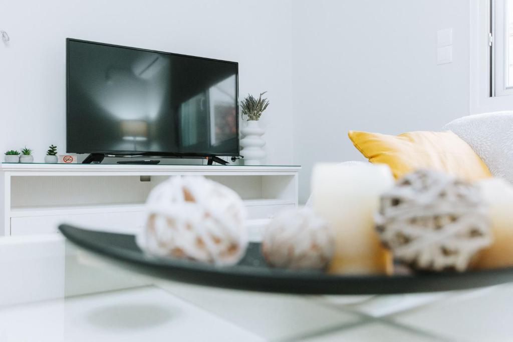 TV a/nebo společenská místnost v ubytování Hermes Appartment