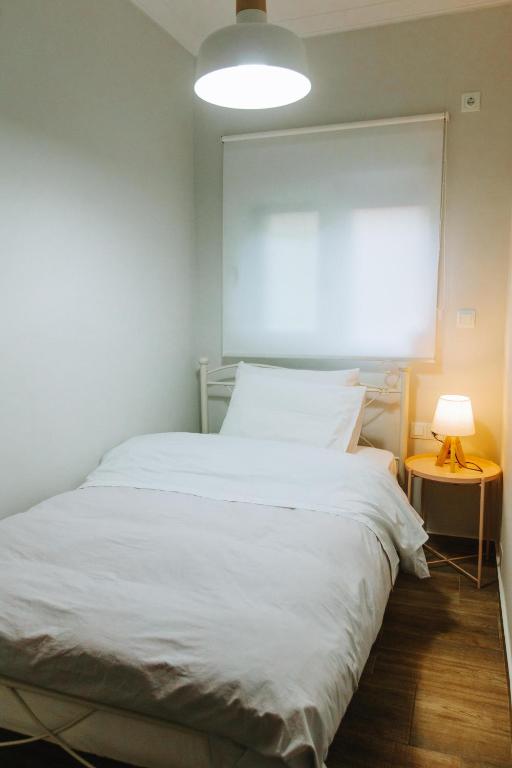 Postel nebo postele na pokoji v ubytování Hermes Appartment