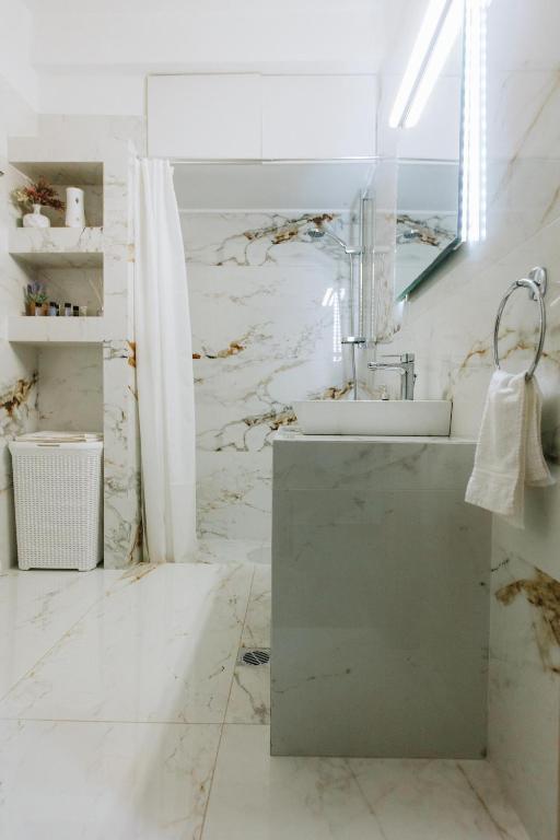 Koupelna v ubytování Hermes Appartment