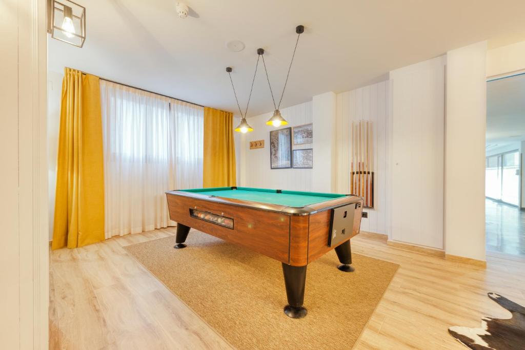 Biliár nebo kulečník v ubytování Hotel Viella