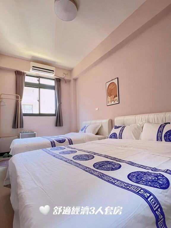 Postel nebo postele na pokoji v ubytování Dear B&B Building II