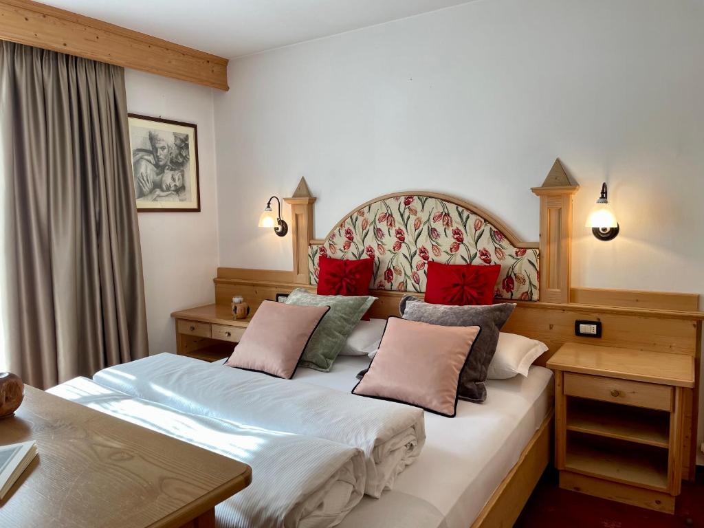 Postel nebo postele na pokoji v ubytování B&B Tamarindo