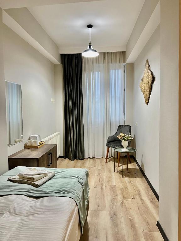 Postel nebo postele na pokoji v ubytování GABATA INN