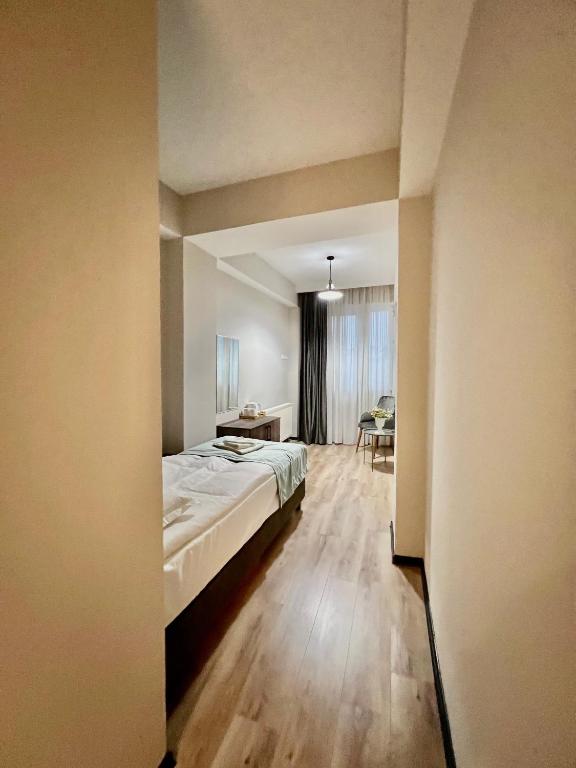 Postel nebo postele na pokoji v ubytování GABATA INN