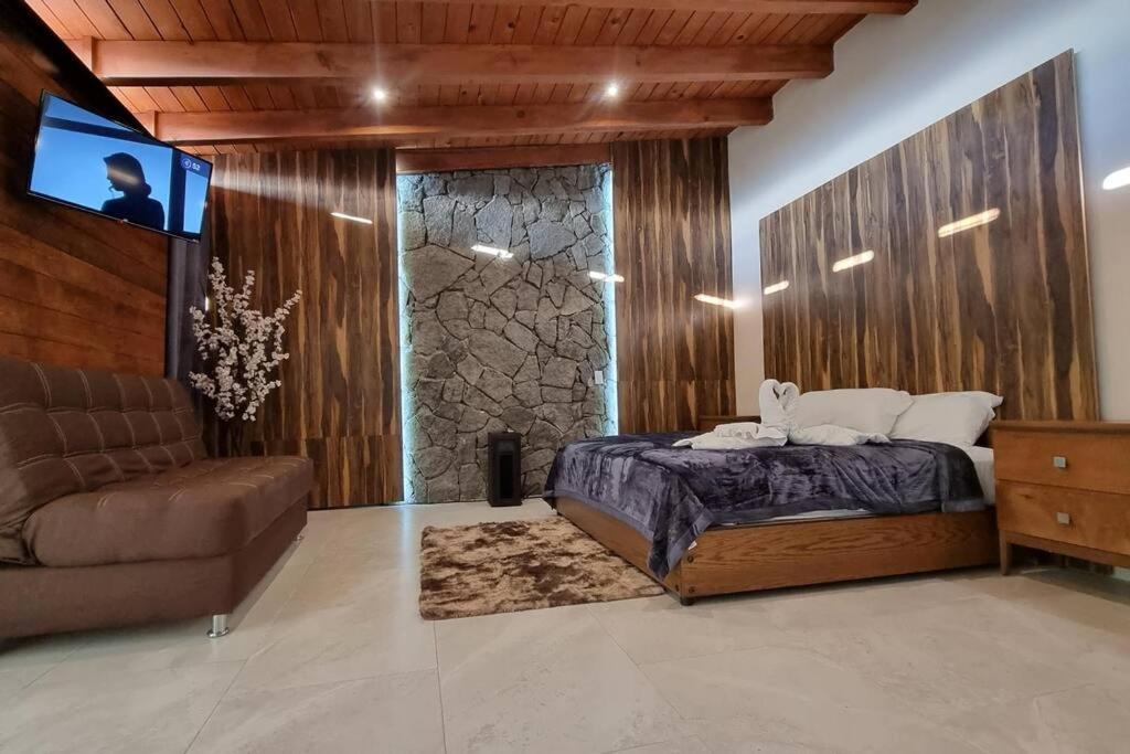 Postel nebo postele na pokoji v ubytování No 4 Lofts Jacuzzi Mazamitla