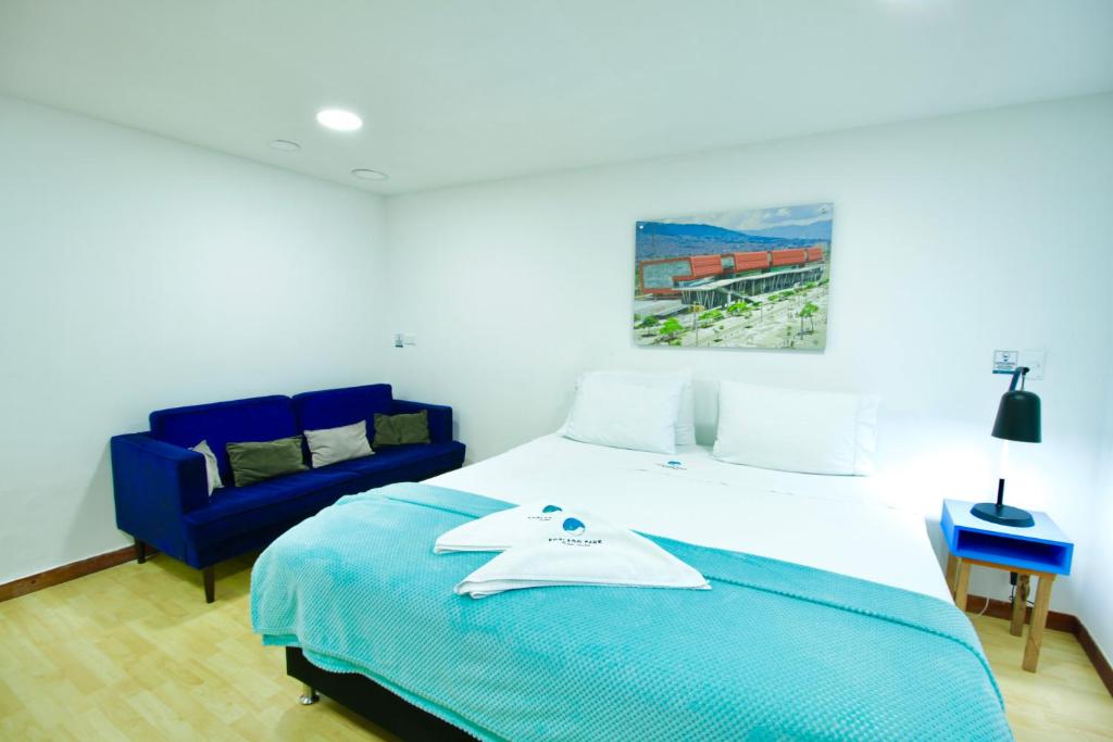 Postel nebo postele na pokoji v ubytování Poblado Park Guest House