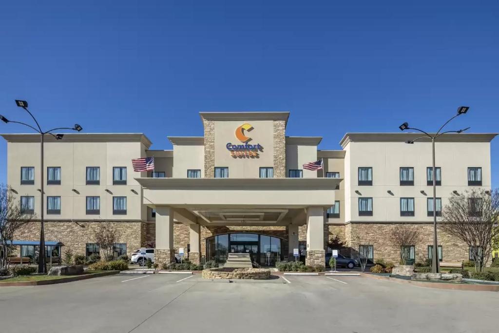 une représentation de l'avant d'un hôtel dans l'établissement Comfort Suites Batesville, à Batesville